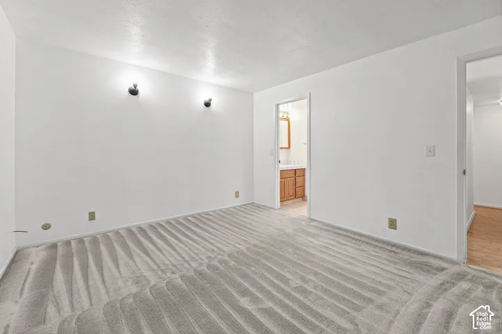 Plush carpeting throughout, with a neutral color palette
