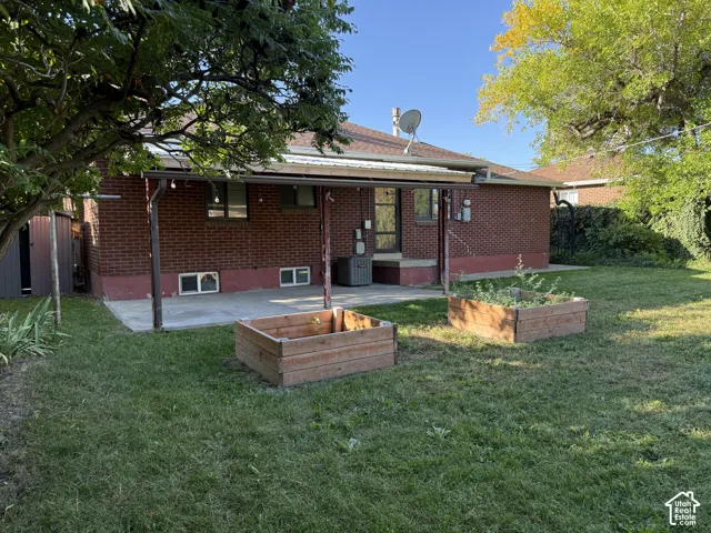 Back yard, featuring covered patio