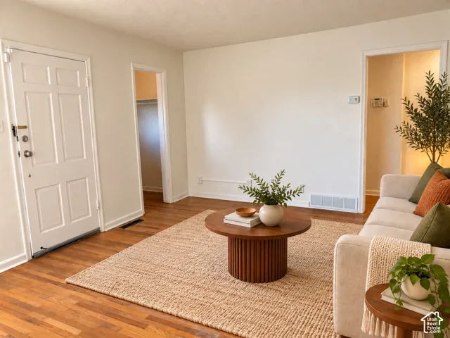 Bright open living room with closet