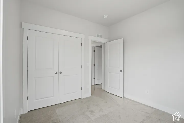 Light gray carpeting throughout