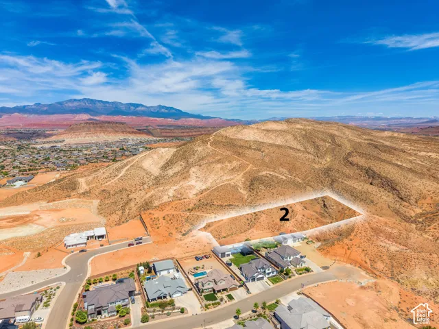 Expansive desert landscape with distant mountains