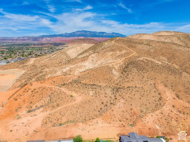 Expansive desert landscape with rolling hills