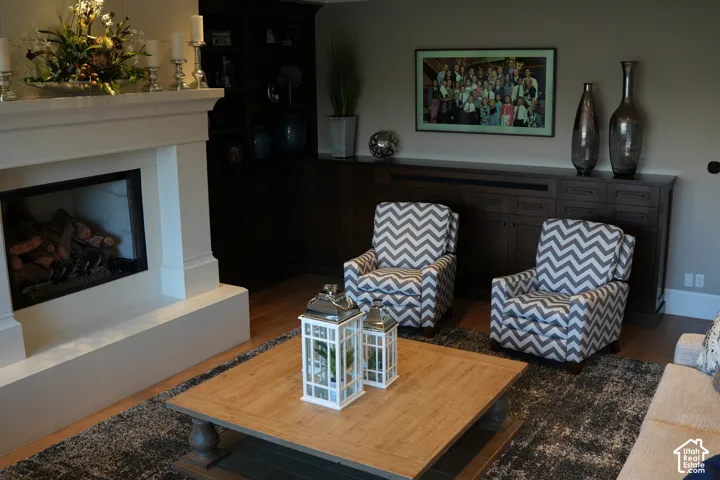 White mantel fireplace with a dark firebox