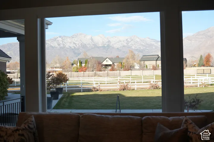 Expansive windows framing a mountain backdrop