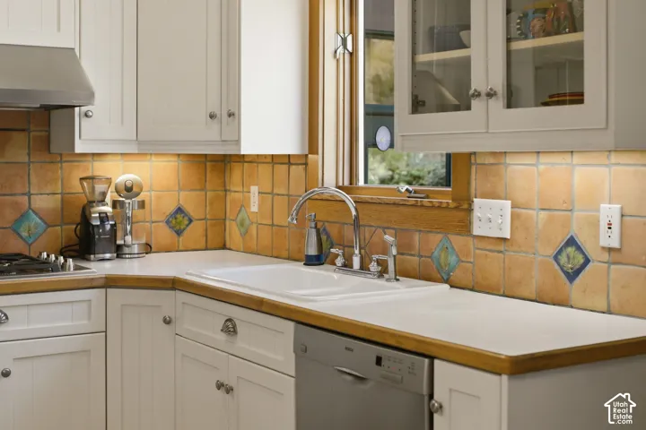 White cabinetry with under-cabinet lighting