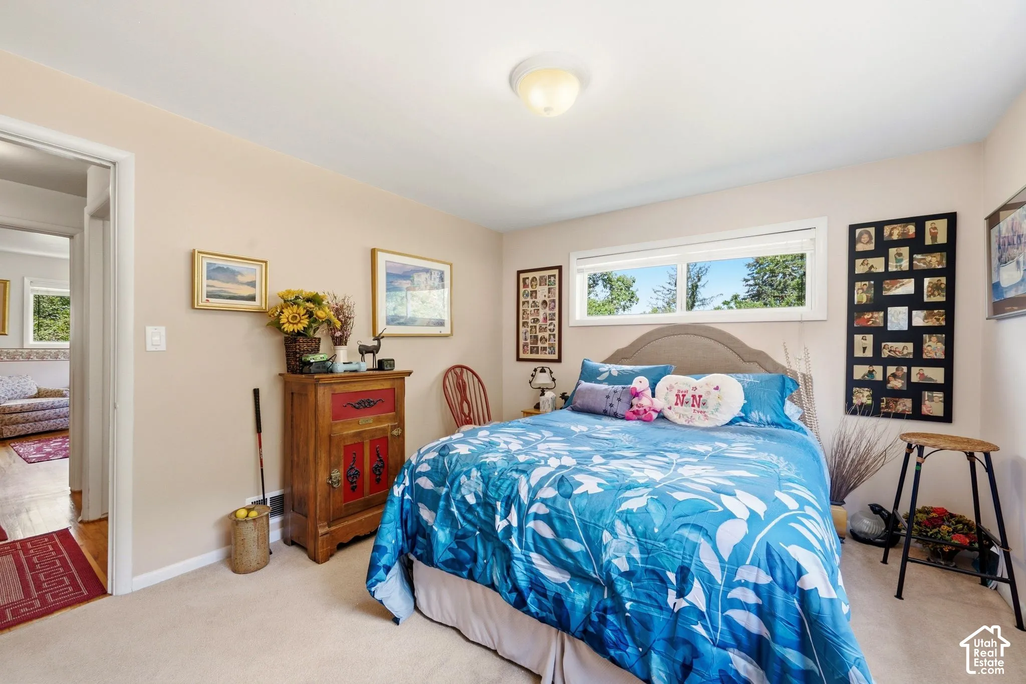 Neutral wall color and plush carpeting create a serene atmosphere
