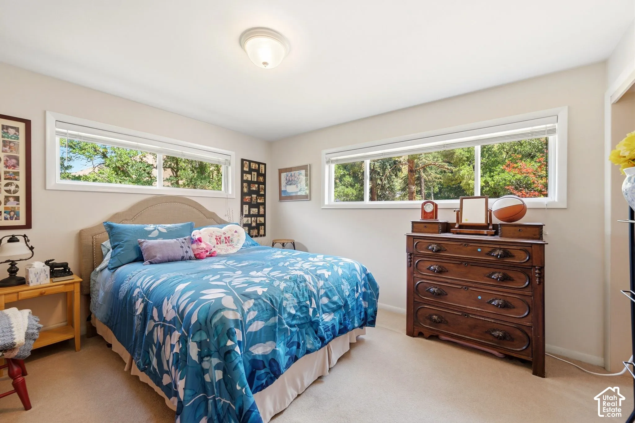 Wall-to-wall carpeting and neutral wall paint