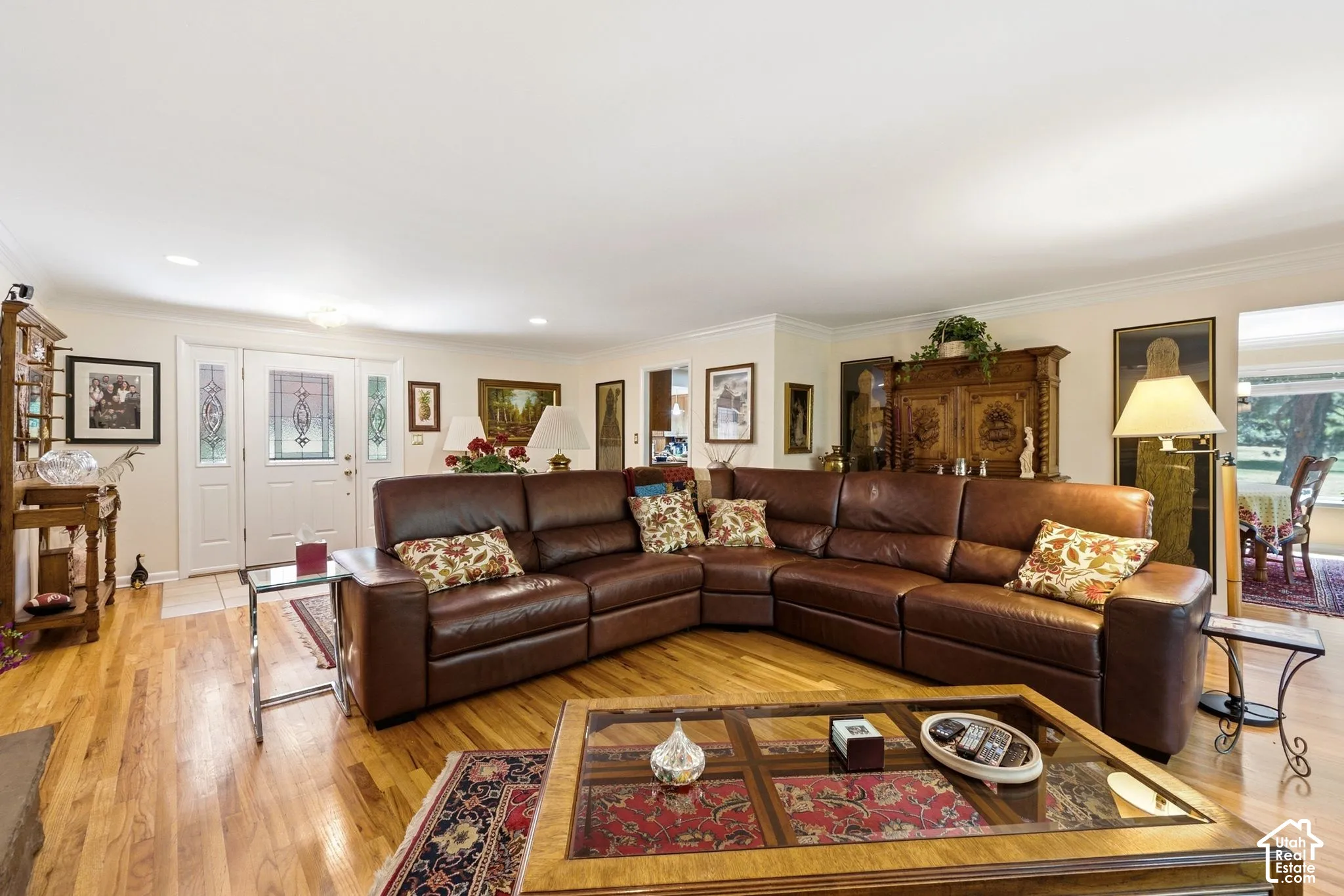 Hardwood flooring, painted walls, white trim, recessed lighting, double entry doors with decorative glass inserts