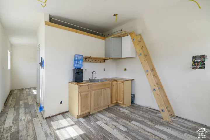 Wood-finish flooring throughout