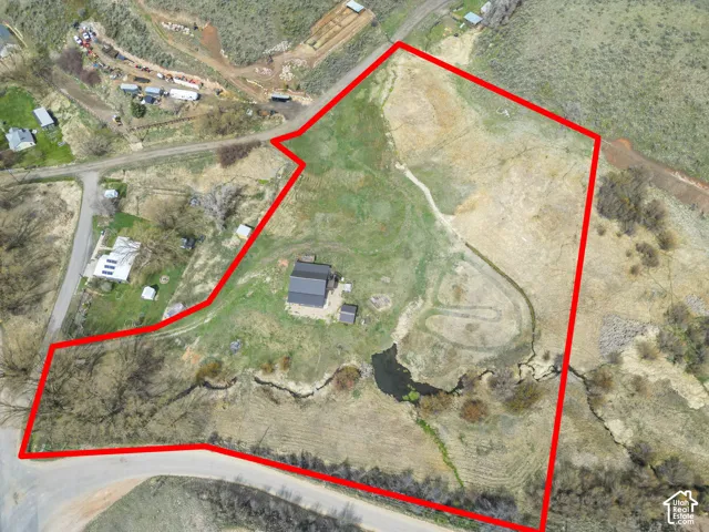 Aerial view. Illustrating the property boundary and its topographical features
