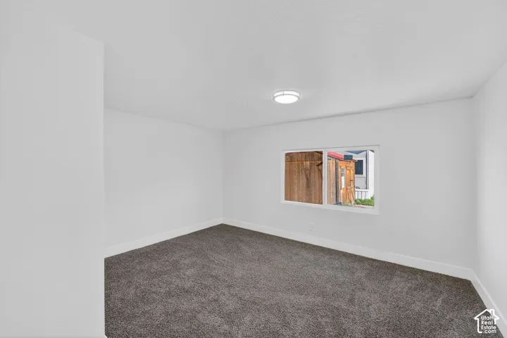 Neutral-toned carpeting and white walls