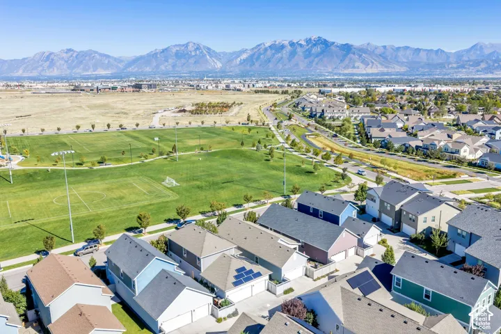 Expansive green space featuring athletic fields and walking paths