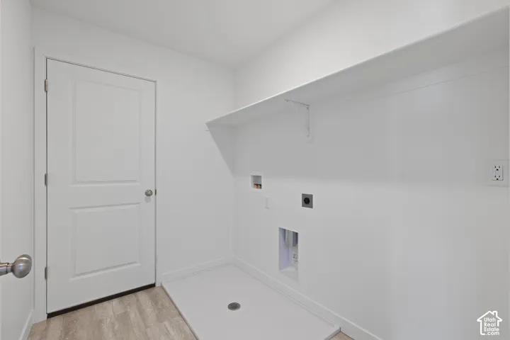Integrated utility connections, overhead shelving, and wood-finish flooring