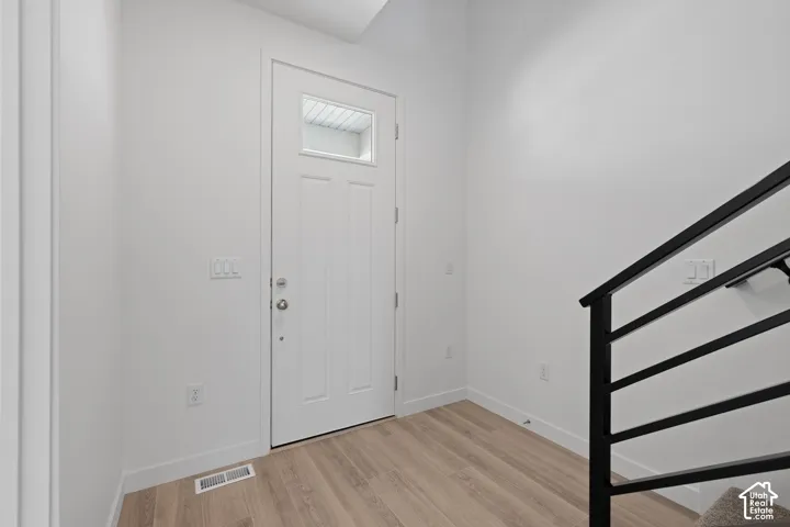 White entry door with window pane