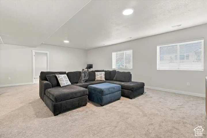 Neutral-toned carpeting throughout