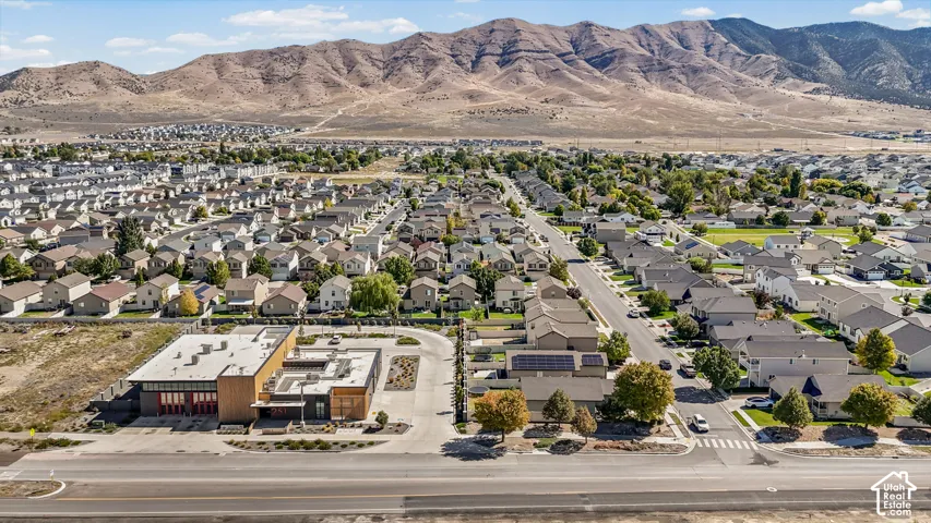 Expansive residential community with established streets and a prominent mountain backdrop
