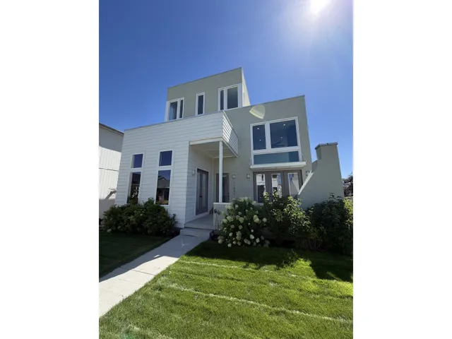 Contemporary exterior design featuring stucco and horizontal siding