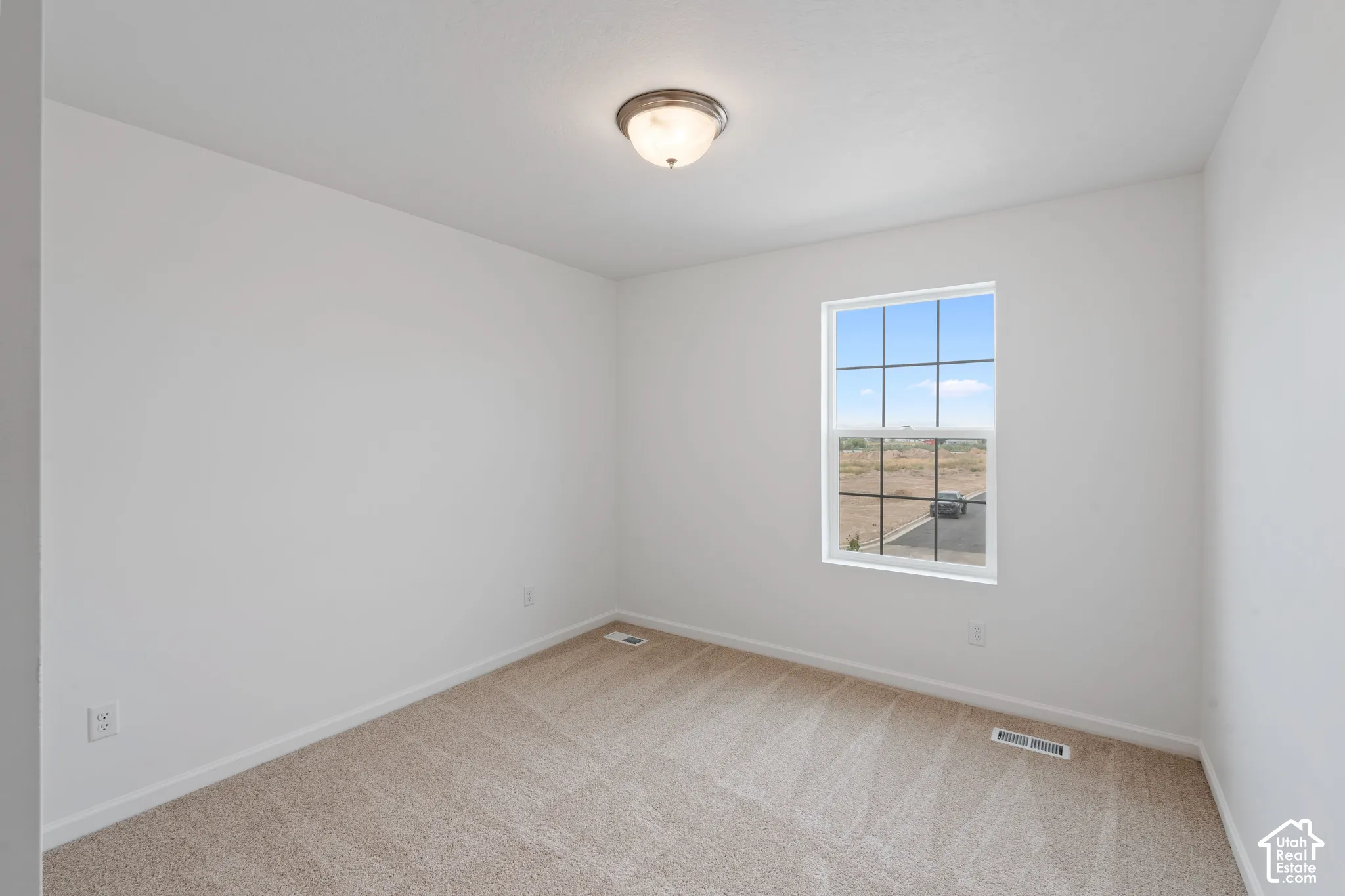 HOME TO BE BUILT! Pictures are of another similar Spec and not of this exact home. Colors and other options may vary from those seen here. Please see Sales consultant for details. Neutral tone wall paint, light-toned carpet flooring, a multi-pane window,