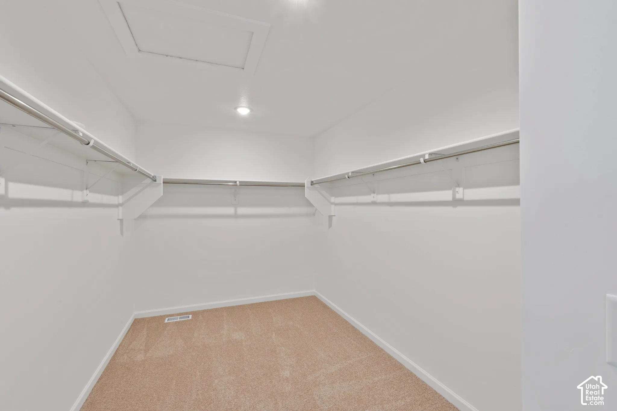 Primary walk in closet. HOME TO BE BUILT! Pictures are of another similar Spec and not of this exact home. Colors and other options may vary from those seen here. Please see Sales consultant for details.