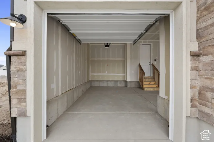 HOME TO BE BUILT! Pictures are of another similar Spec and not of this exact home. Colors and other options may vary from those seen here. Please see Sales consultant for details. Attached 3rd car garage with concrete flooring, stone veneer accents, and e