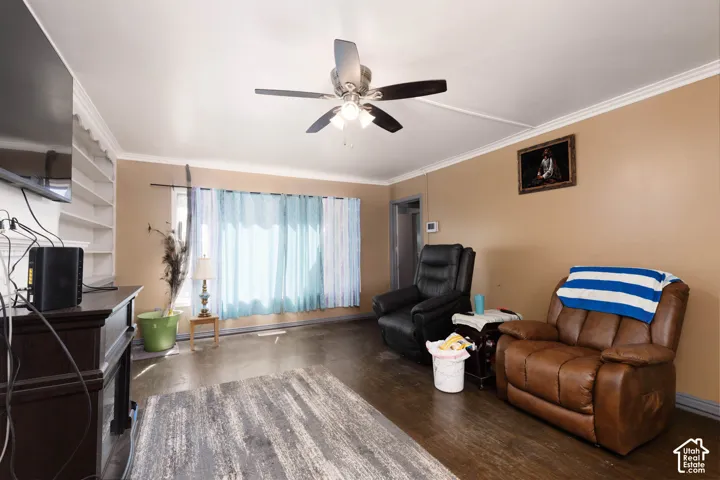 Warm-toned walls with crown molding and wood-finish flooring