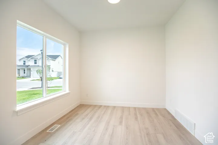 Living room/office adjacent to front entry.