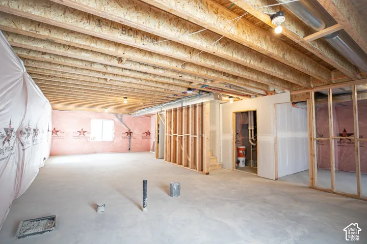 Unfinished basement with potential for large family/game room, full bathroom and two bedrooms.