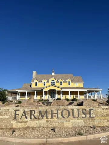 Yellow-painted exterior with multiple dormer windows