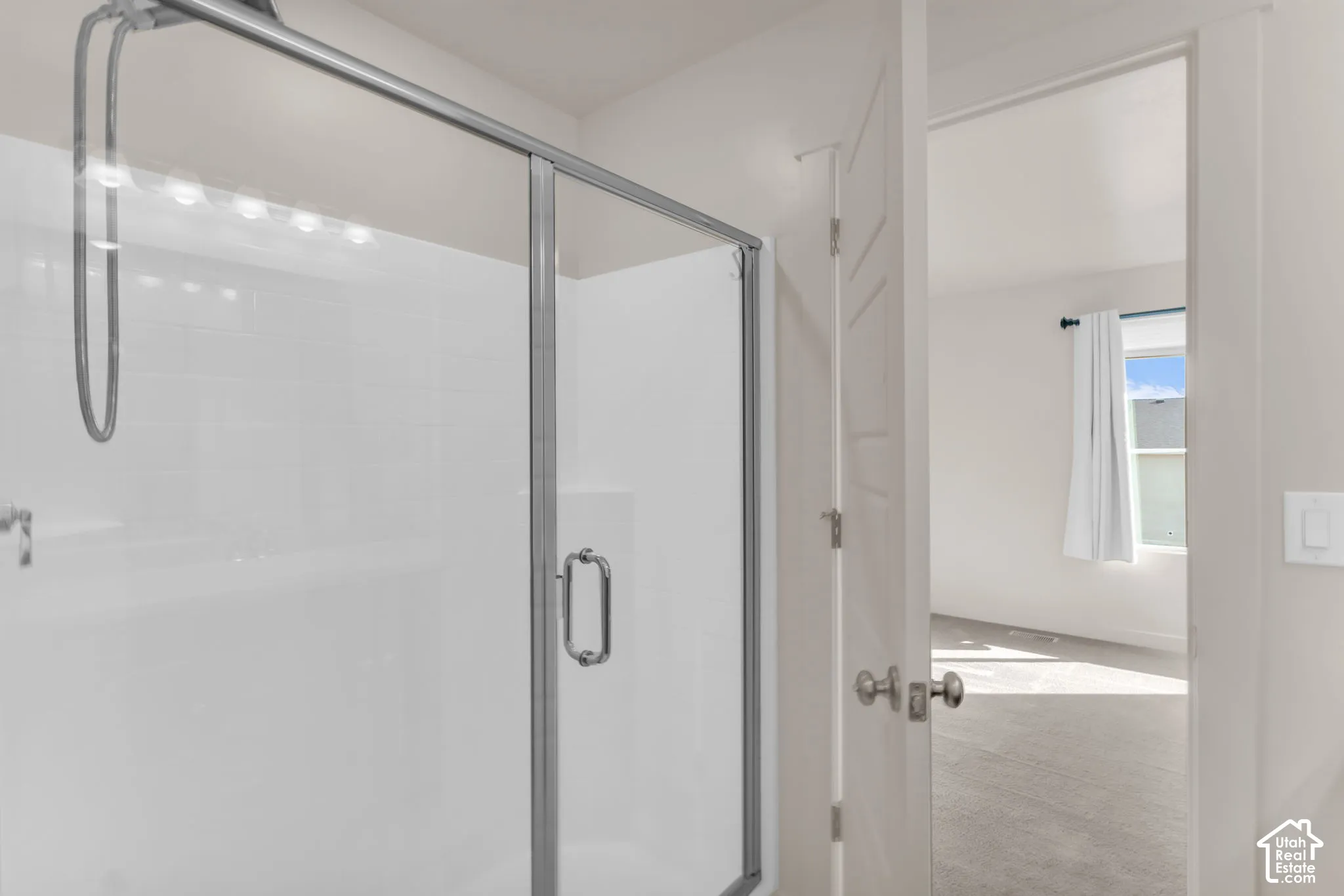 Owner's Suite - Shower enclosure with clear glass door and brushed nickel hardware