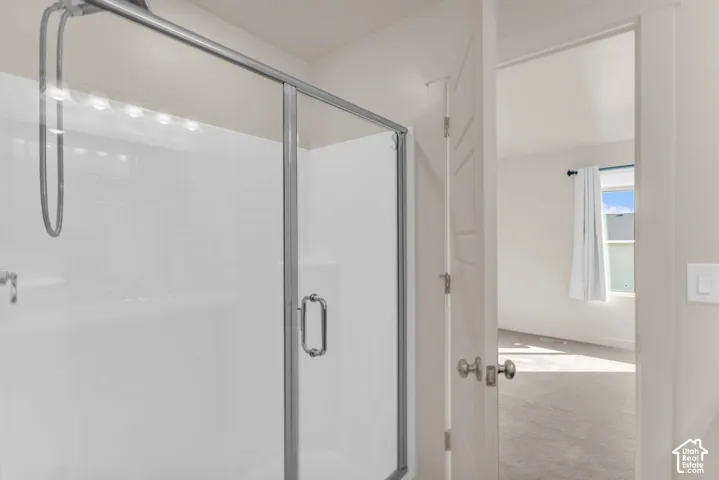 Owner's Suite - Shower enclosure with clear glass door and brushed nickel hardware