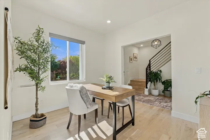 Open concept design with wood-finish flooring
