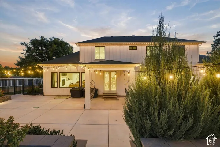 Expansive concrete patio with integrated lighting