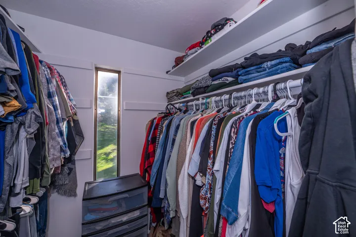 Primary ensuite closet with window