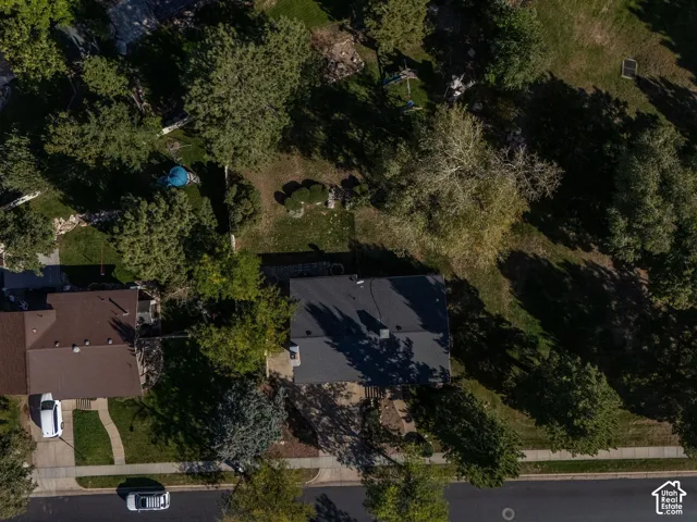 drone photo of the home and property