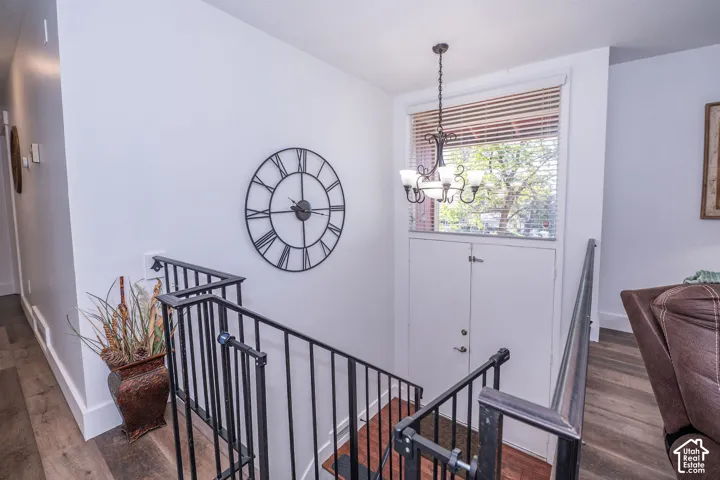 White walls complement the wood-finish flooring