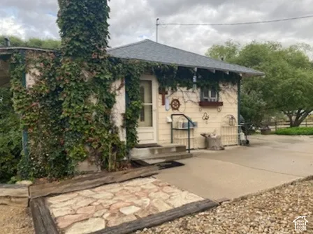 Side entrance next to the large RV carport.