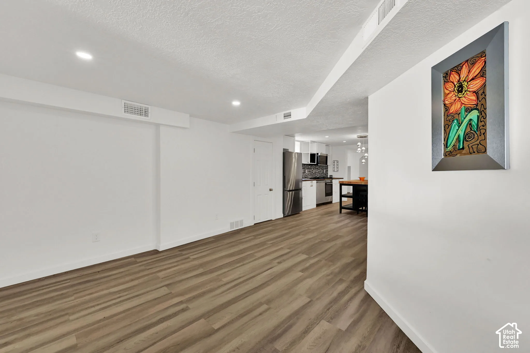 Wood-finish flooring with recessed lighting