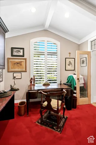 Vaulted ceiling with exposed beams and recessed lighting
