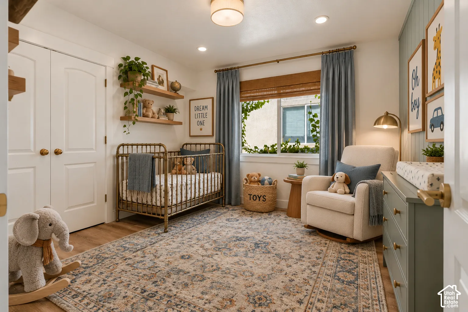 Bedroom # 2 Wood-finish flooring, white double doors, floating wood shelves, recessed lighting, and a large window with privacy blinds
