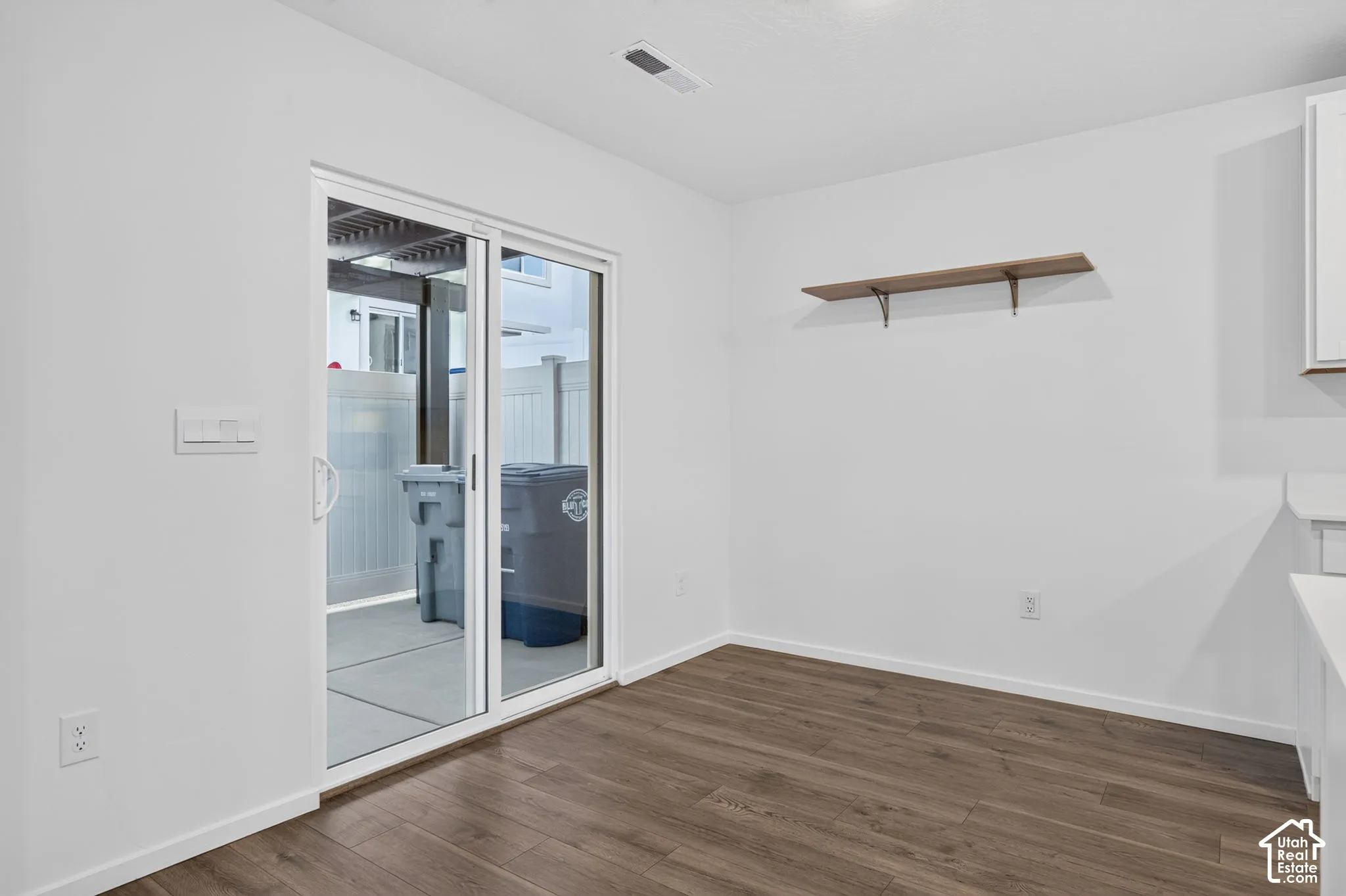 Wood-finish flooring with crisp white walls
