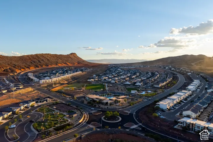 Expansive residential development featuring varied architectural styles and an integrated community green space