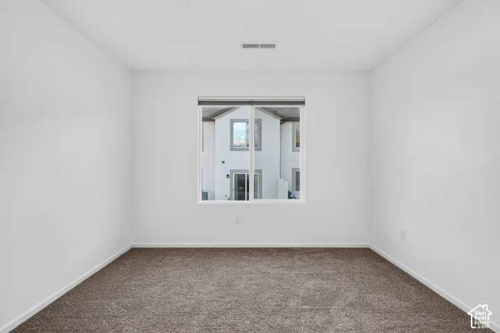 Neutral wall color with a framed window