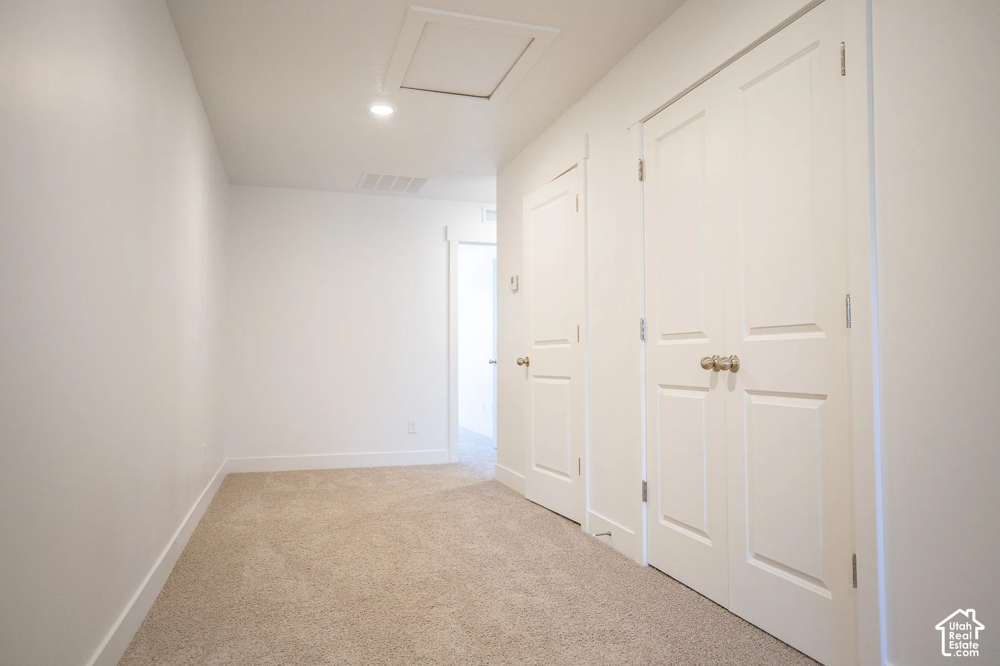 Upstairs hallway with closet
