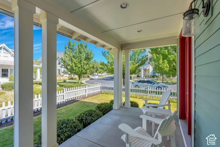 Covered front porch with recessed lighting