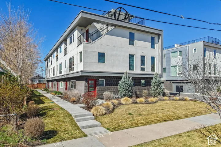 Contemporary multi-level exterior with a flat roofline