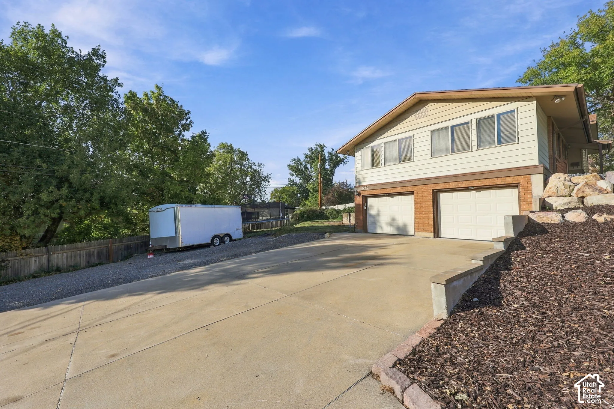 Two-car garage, with oversized driveway on corner lot