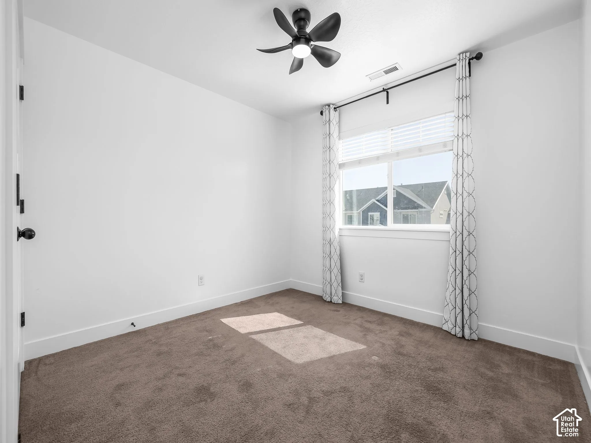 Window with blinds and drapes, recessed lighting, and a ceiling fan