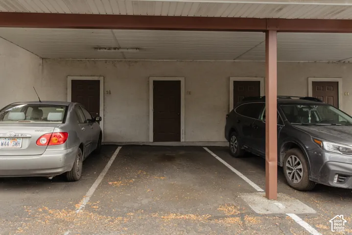 Covered parking area with designated parking spaces