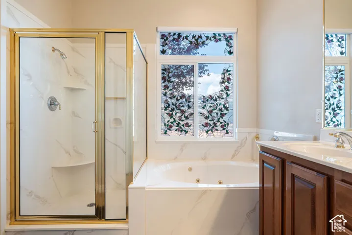 Jetted tub with decorative stained glass window