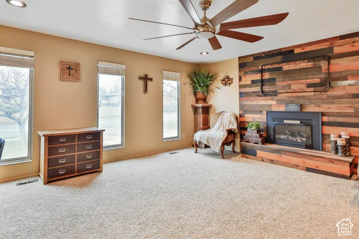 Reclaimed wood-finish accent wall with a built-in fireplace